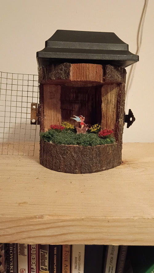 Guardian Fairy Lamp with door open showing the fairy and flowers